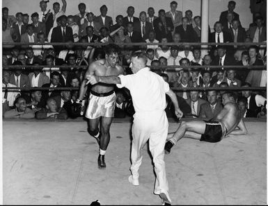 Boxer Tuna Scanlan being sent to his corner during a match