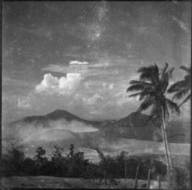 Cloud formations after the eruption and mountains in the distance, Rabaul, New Guinea, 1937 / Sarah Chinnery