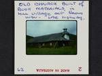 Old church built of bush materials, in hill village out from Wau, Lae Highway