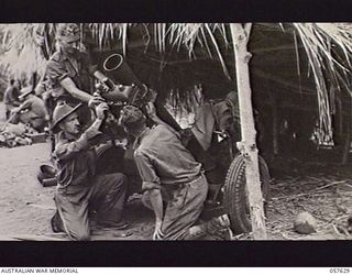 UMI RIVER, NEW GUINEA. 1943-09-29. A LIGHT 25 POUNDER GUN IN POSITION UNDER A GRASSED SHELTER AT SAGARAK