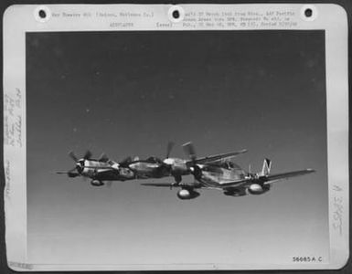 In Tight Formation Over Saipan, A Republic P-47, Lockheed P-38, And A North American P-51 Show What The Japs Can Expect To See In The Near Future Over Tokyo. P-47S Helped Take Marianas Bases From Which The P-38S Flew Strafing And Escort Missions To Help (U.S. Air Force Number 56685AC)