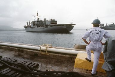 Port quarter view of the combat stores ship USS NIAGARA FALLS (AFS 3) arriving at Naval Station Guam