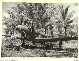 1943-01-11. SALVAGING AEROPLANES IN NEW GUINEA. LITTLE IS HEARD OF THE GROUND STAFF OF THE RAAF - THE MEN WHO WORK ALL HOURS AND UNDER ALL CONDITIONS, KEEPING OUR PLANES IN THE AIR, AND STILL LESS ..