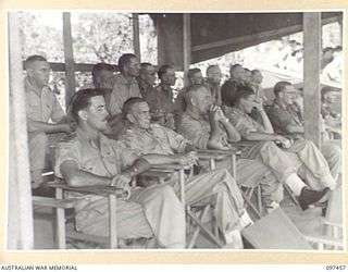 TOROKINA, BOUGAINVILLE. 1945-10-03. MAJOR GENERAL W. BRIDGEFORD, GENERAL OFFICER COMMANDING 3 DIVISION (3) AND SENIOR OFFICERS ATTENDING THE SOLEMN HIGH MASS OF THANKSGIVING FOR PEACE HELD AT ..