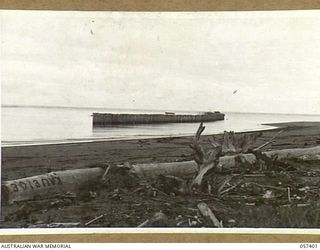 MIRAVASI, NEW GUINEA, 1943-09-07. THE GROYNE WHICH WAS CONSTRUCTED BY THE ENGINEERS OF THE 2/4TH AUSTRALIAN FIELD SQUADRON, ROYAL AUSTRALIAN ENGINEERS TO SCOUR A CHANNEL THROUGH A SANDBANK AT THE ..