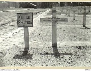 BOUGAINVILLE ISLAND, 1944-11-17. THE GRAVE OF KEITH PALMER, AUSTRALIAN WAR CORRESPONDENT, IN THE ALLIED SECTION OF THE UNITED STATES WAR CEMETERY