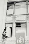 Fijian Firewalker entering rear of Milne & Choyce Building, Queen Street, Auckland