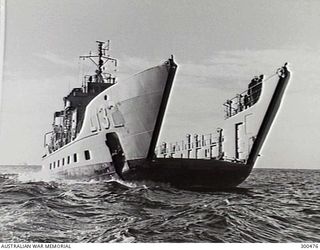 VIEW FROM FINE ON THE STARBOARD BOW OF THE LANDING CRAFT HEAVY HMAS BUNA (L132). NOTE THAT THE BOW RAMP IS NOT FITTED. (NAVAL HISTORICAL COLLECTION)