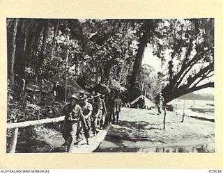 TSIMBA AREA, BOUGAINVILLE ISLAND. 1945-02-06. A ENGINEER PATROL LEAVING THE CAMP AREA OF THE 31/51ST INFANTRY BATTALION FOR AN ATTEMPT TO RECOVER A JAPANESE MOUNTAIN GUN
