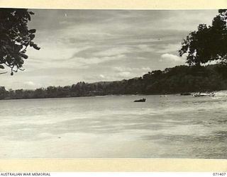 SIKI COVE, FINSCHHAFEN AREA, NEW GUINEA. 1944-03-21. A SECTION OF THE PANORAMA VIEWED FROM THE NORTH END OF SCARLET BEACH PICTURING SIKI COVE IN THE DISTANCE. THE SCENE IS WITHIN THE AREA OF ..