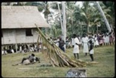 Men in manuru play