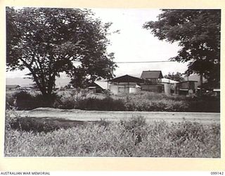 LAE, NEW GUINEA. 1945-11-20. THE ICEWORKS, FORMERLY THE BURNS PHILP'S FREEZERS, WHICH HAVE BEEN USED SINCE THE OUTBREAK OF WAR BY AUSTRALIANS, JAPANESE, AMERICANS AND AGAIN BY AUSTRALIANS. IT ..