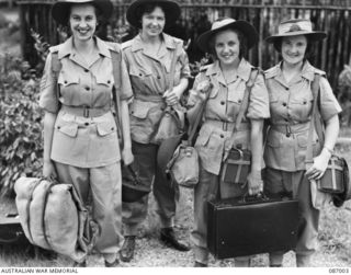 BRISBANE, QLD. 1945-02-21. AUSTRALIAN ARMY MEDICAL WOMEN'S SERVICE REINFORCEMENTS AT FRAZER'S PADDOCK BEFORE THEIR EMBARKATION TO THE 2/1 GENERAL HOSPITAL AT BOUGAINVILLE. IDENTIFIED PERSONNEL ..