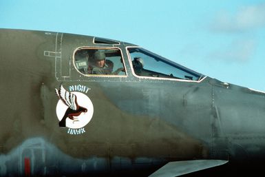 The co-pilot of a 96th Bombardment Wing (96th BMW) B-1B aircraft looks out a side window as the aircraft taxis off of the runway after arriving for exercise GIANT WARRIOR '90. The 96th BMW is based at Dyess Air Force Base, Texas