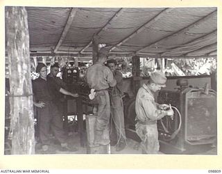 RATAVAL, NEW BRITAIN. 1945-11-17. A PARTICULARLY FINE JAPANESE LIGHTING PLANT WHICH IS BEING USED TO SUPPLY LIGHT AND POWER TO 2/4 ARMOURED REGIMENT CAMP