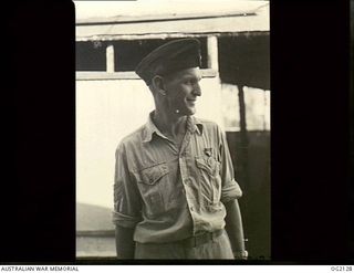 NEW GUINEA. C. 1945. PORTRAIT OF SERGEANT ARTHUR S. MARTIN OF COBURG, VIC, ON WHOM A RARE DISTINCTION WAS CONFERRED WHEN HE RECEIVED THE AMERICAN SOLDIER'S MEDAL FOR HIS HEROISM IN SAVING THE LIFE ..