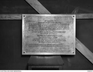 LAE, NEW GUINEA, 1946-01-09. THE BRONZE PLAQUE (SIZE 16 X 19 INCHES) TO COMMEMORATE THE SIGNING OF THE JAPANESE SURRENDER AT WEWAK, WHICH IS TO BE PLACED ON THE MONUMENT IN THE FORM OF A CONCRETE ..