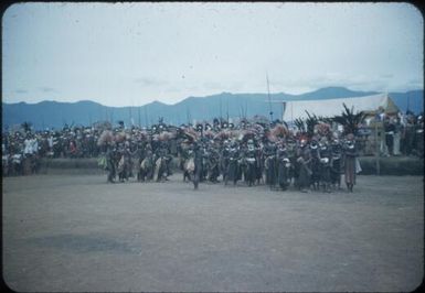 New Year's Day festivities at Minj Station, 1955, coastal and highland dancers are performing (1) : Minj Station, Wahgi Valley, Papua New Guinea, 1954 / Terence and Margaret Spencer