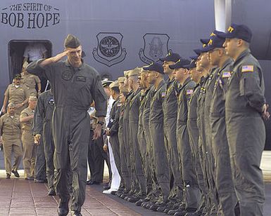 Sergeant (SGT) Richard Pray, USMC, a crew member from the USN EP-3 Aries II aircraft involved in the March 31st accident with a Chinese F-8 aircraft, salutes senior military officials and civilian leaders as they welcome him at Hickam AFB, Hawaii. The crew arrived at Hickam AFB, HI from Anderson AB, Guam on board an USAF C-17 Globemaster III aircraft, as part of Operation VALIANT RETURN. The EP-3 crew members were detained in China for 17 days prior to being released