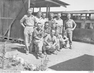 LAE, NEW GUINEA. 1945-12. COOKS FROM 4TH ADVANCED ORDNANCE DEPOT. SHOWN: N437276 PRIVATE (PTE) E. W. DEVINE (1); V68012 CORPORAL G. F. SPOSITO (2); N249300 PTE N. C. HURST (3); QX47974 PTE T. A. ..