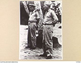 1945-02. LT CDR E.A. FELDT, RAN, TAKES OVER FROM CDR E.H. KINCAID, USN, AS NOIC, TOROKINA, SOLOMON ISLANDS