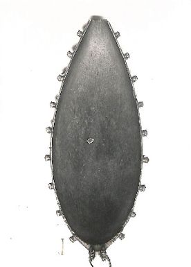 Photo of an oval-shaped wooden art piece. British Museum (LXIII/25)