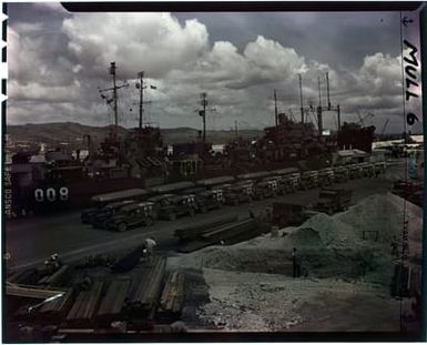 Photograph of Ambulances Lined Up Awaiting the Arrival of the USS Tranquility (AH-14)