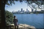 Anne Scheffler looking at the city from across the river