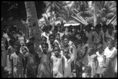 Group of village people : Mortlock Islands, Papua New Guinea, 1960 / Terence and Margaret Spencer