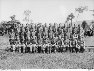 Torokina, Bougainville. 1945-10-12. Group portrait of the members of Headquarters 5th Battery, 2nd Field Regiment. Left to right, back row: VX87745 Lance Sergeant (LSgt) A. E. Francis of Caulfield, ..