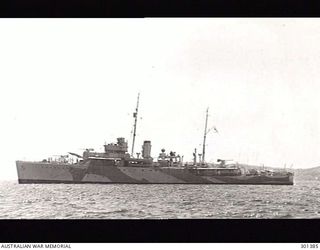 PORT MORESBY, NEW GUINEA. 1941-12-30. PORT SIDE VIEW OF THE SLOOP HMAS SWAN (II) (U74). HER ORIGINAL ARMAMENT OF THREE 4 INCH MARK V GUNS ON MARK III HIGH ANGLE MOUNTINGS AND A QUADRUPLE .5 INCH ..