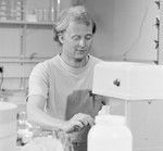 Michael Edward Huber, a Scripps Institution of Oceanography graduate student, conducts experiments in his lab. His 1983 Thesis (Ph.D.) was titled: Ethology and population biology of Trapezia, a xanthid crab symbiotic with reef corals : with special reference to territoriality and speciation. In 1988, Huber moved to the University of Papua New Guinea to study and dive on some of the world's most spectacular coral reefs. He served as Head of the University's marine research station on Motupore Island, and became increasingly interested in marine environmental science, especially with regard to reefs, mangroves, seagrass beds, and other tropical systems. This interest continued to grow during four years as Director of a marine research station on the Great Barrier Reef. November 3, 1980