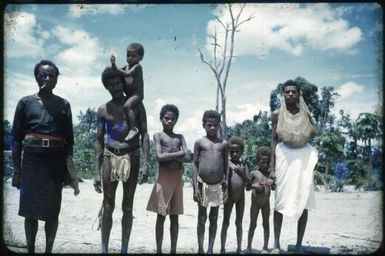 Village policeman and his family return to Higataru, Papua New Guinea, 1951 / Albert Speer