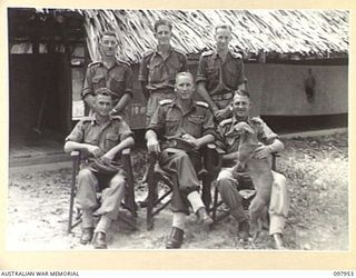 TOROKINA, BOUGAINVILLE. 1945-10-12. THE BRIGADIER ROYAL ARTILLERY WITH OFFICERS OF HEADQUARTERS 3 DIVISION, ROYAL AUSTRALIAN ARTILLERY