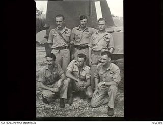 VIVIGANI, GOODENOUGH ISLAND, PAPUA. 1944-01-18. AN INFORMAL GROUP PORTRAIT OF WEST AUSTRALIANS WITH NO. 6 (BEAUFORT) SQUADRON RAAF. STANDING AT THE TAIL OF THE AIRCRAFT, LEFT TO RIGHT: FLIGHT ..