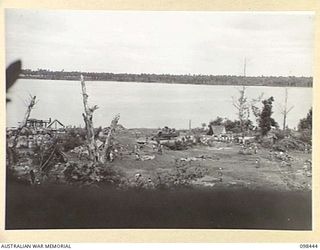 JAPANESE WORKING PARTIES CLEARING THE AREA FOR THE ANGAU ADMINISTRATIVE HEADQUARTERS BEING SET UP AT KAVIENG. CAPTAIN F.N.W. SHAND, ANGAU DISTRICT OFFICER, WILL BE IN CHARGE OF THE HEADQUARTERS ..