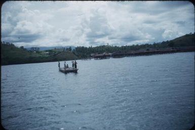 Tupesleia village, children on a canoe : Port Moresby, Papua New Guinea, 1953 / Terence and Margaret Spencer