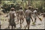 Maenaa'adi, Dangeabe'u and young men entering clearing with cordyline