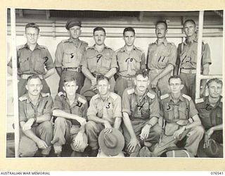 AT SEA. 1944-10-07. OFFICERS OF THE 36TH INFANTRY BATTALION ABOARD THE DUTCH TROOPSHIP, "SWARTENHONDT" WHILE EN ROUTE FROM NEW GUINEA TO NEW BRITAIN. IDENTIFIED PERSONNEL ARE:- NX141455 CAPTAIN ..