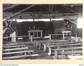 TOROKINA, BOUGAINVILLE, 1945-07-12. THE INTERIOR OF THE NEW CHAPEL AT HEADQUARTERS 2 CORPS. IT WAS OPENED WITH A CONFIRMATION SERVICE CONDUCTED BY CHAPLAIN GENERAL C.L. RILEY, CHURCH OF ENGLAND, ..