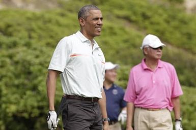 Barack Obama plays golf with Prime Minister Najib Razak, Joe Paulsen, and Mike Brush in Kaneohe Bay, Hawaii, December 24, 2014