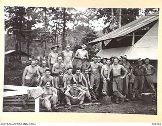 JACQUINOT BAY, NEW BRITAIN, 1945-08-11. A GROUP OF WORKERS AT 5 DIVISION RECEPTION CAMP. THE MEN BUILT HUTS AT THE CAMP