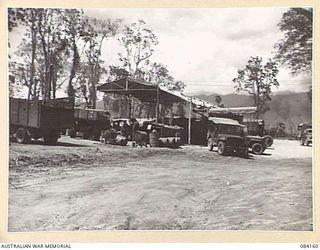 TOROKINA AREA, BOUGAINVILLE, SOLOMON ISLANDS. 1944-12-09. THE WORKSHOP QUARTERS OF THE 126 BRIGADE WORKSHOP SITUATED ON A TEMPORARY SITE PREVIOUSLY OCCUPIED BY AMERICAN TROOPS