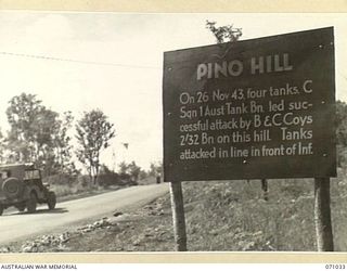 PINO HILL, FINSCHHAFEN AREA, NEW GUINEA. 1944-03-13. ONE OF MANY BATTLE SIGNS IN THE FINSCHHAFEN AREA, THIS SIGN RECORDS ACTIVITIES OF THE 2/32ND INFANTRY BATTALION. ADVICE RECEIVED FROM THE ..