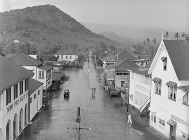 [High angle view of Pacific Island street in the rain]