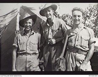 NEW GUINEA, 1943-11. MEMBERS OF NO. 1 WIRELESS UNIT, AUSTRALIAN JAPANESE KANA INTERCEPT WIRELESS OPERATORS. LEFT TO RIGHT: DOUG GOEBEL, STAN KING, BOBBY HEARN. (DONOR S. KING)