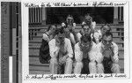 Maryknoll School students wearing gas masks wait for the All Clear, Punahou, Honolulu, Hawaii, ca. 1942