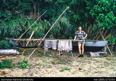 Canoe and seine net at Ratagitagi, with Roger Harding of the Rabaul Volcanological Obersvatory, looking East