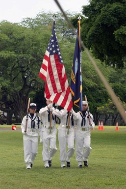 A US Navy (USN) Color Guard conducts a dressed rehearsal before presenting the Colors during a Unit Integration Ceremony at from Pearl Harbor Naval Base, Hawaii (HI)