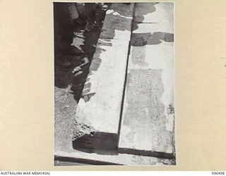RABAUL, NEW BRITAIN, 1945-09-13. CONCRETE SLABS BEARING THE NAMES OF MEMBERS OF 2/22ND INFANTRY BATTALION ON THE SITE IN MALAGUNA AVENUE OF THE FORMER KITCHEN OF THE UNIT. AFTER THE OCCUPATION OF ..